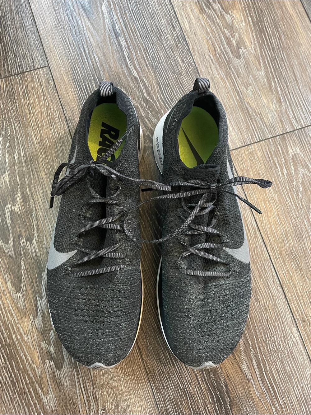 Nike Black Flyknit Running Sneakers with White Swoosh